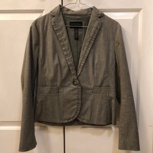 Woman’s grey tweed blazer